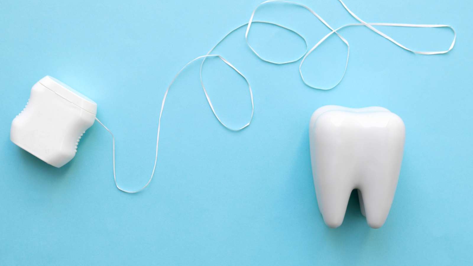 Toothpicks vs string floss - Image of a regular dental floss